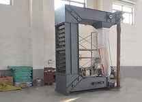Ascensor de galledes en forma de C